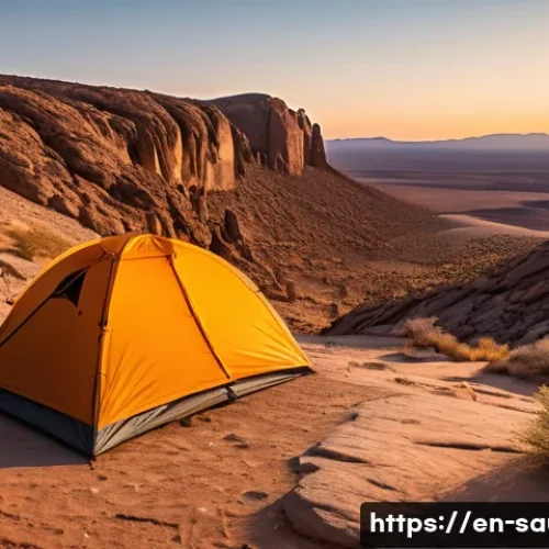 Home 29 사막 캠핑을 위한 필수 준비물 - A desert camping scene at sunset featuring a lightweight, UV-resistant tent pitched on elevated rock...